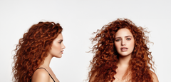 Modelo con cabello rizado rojo cobrizo, mostrando volumen y brillo. - Luxent Professional